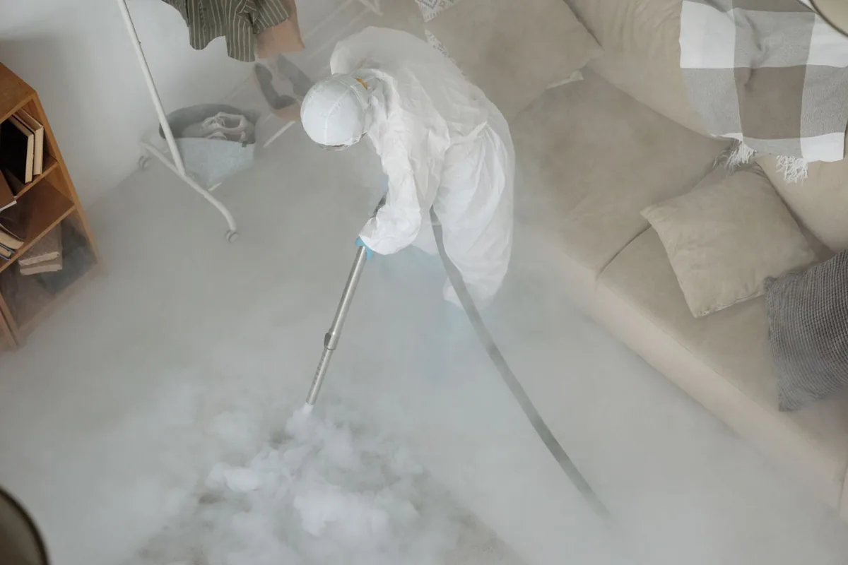 Biohazard cleanup technician in protective equipment, Catlettsburg, KY